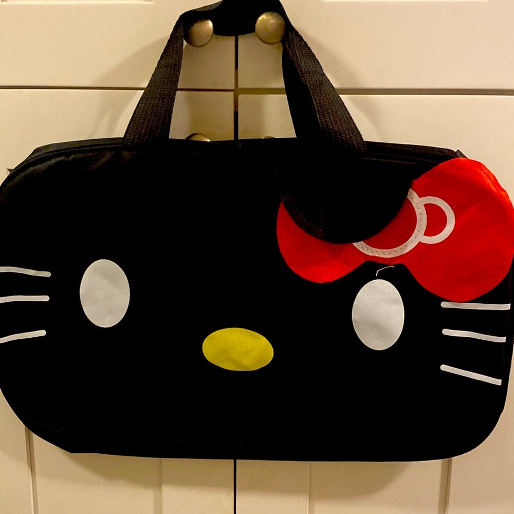 Hello Kitty, black gym bag 19 inches across by 12 inches deep brand new